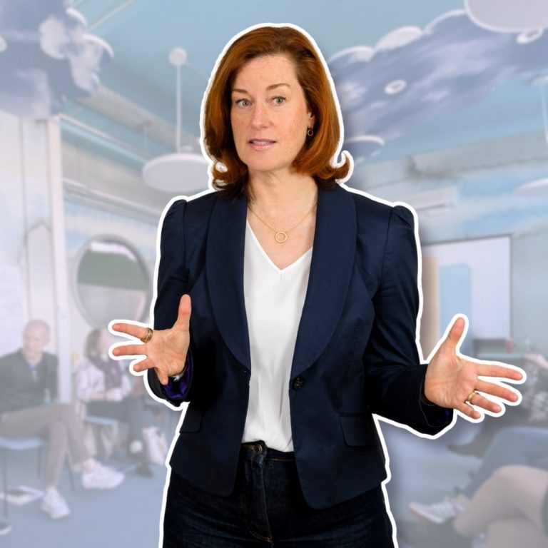 Woman presenting in a team coaching session